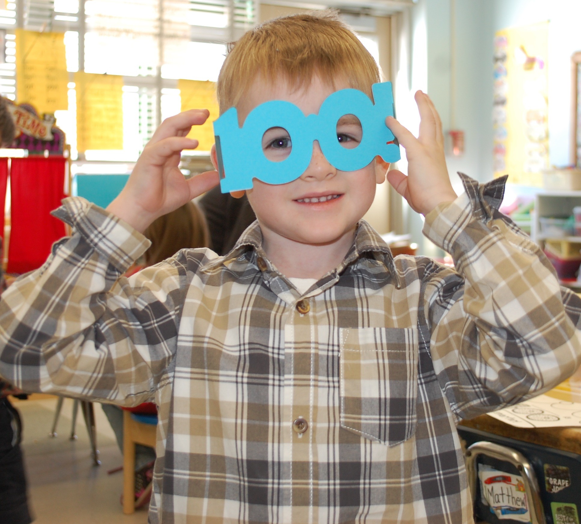 Nicholas Weber, a kindergartner at the Seaford Manor School, tried on special glasses last Friday to celebrate the 100th day of school.
