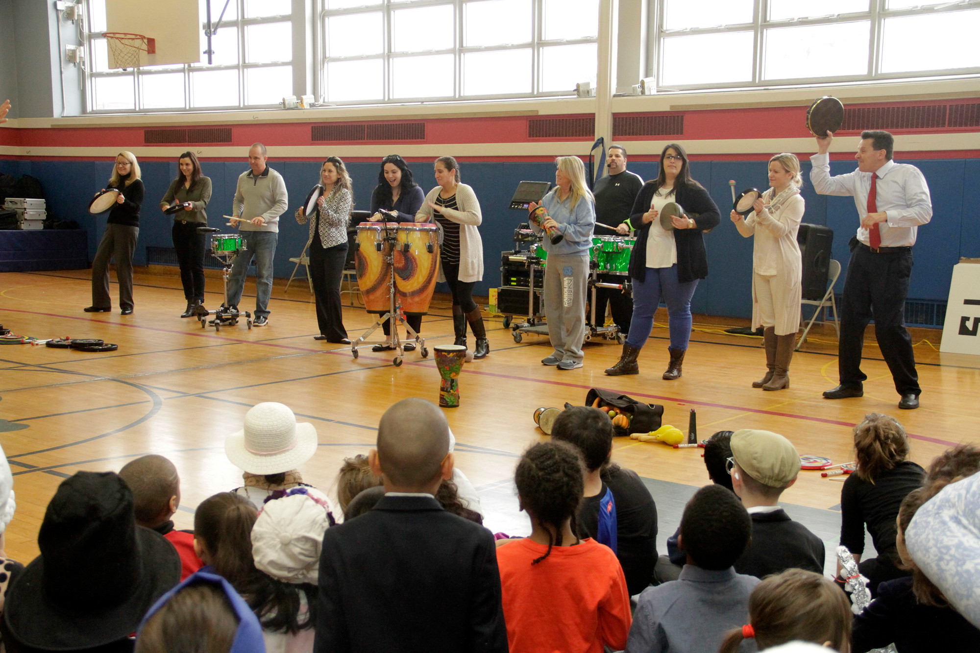 Teachers at the May Lane school played drums during the festive celebration.