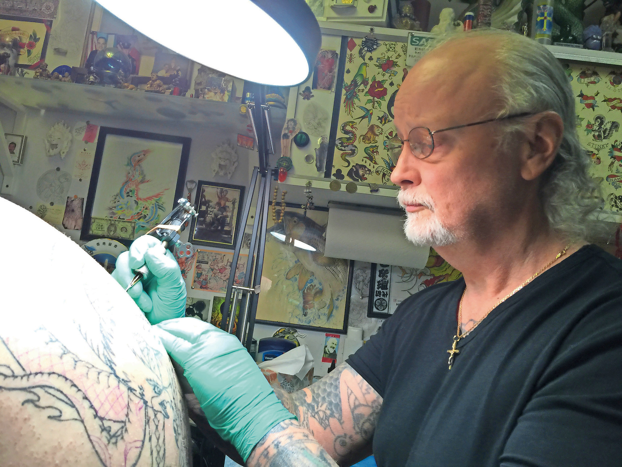 Richie Montgomery took over Long Island Tattoo from Peter Poulos in 1975. He has since renamed the business and moved it east on Hempstead Turnpike twice — once in 1986 and then in 1997, to 1548 Hempstead Turnpike, where he has been ever since