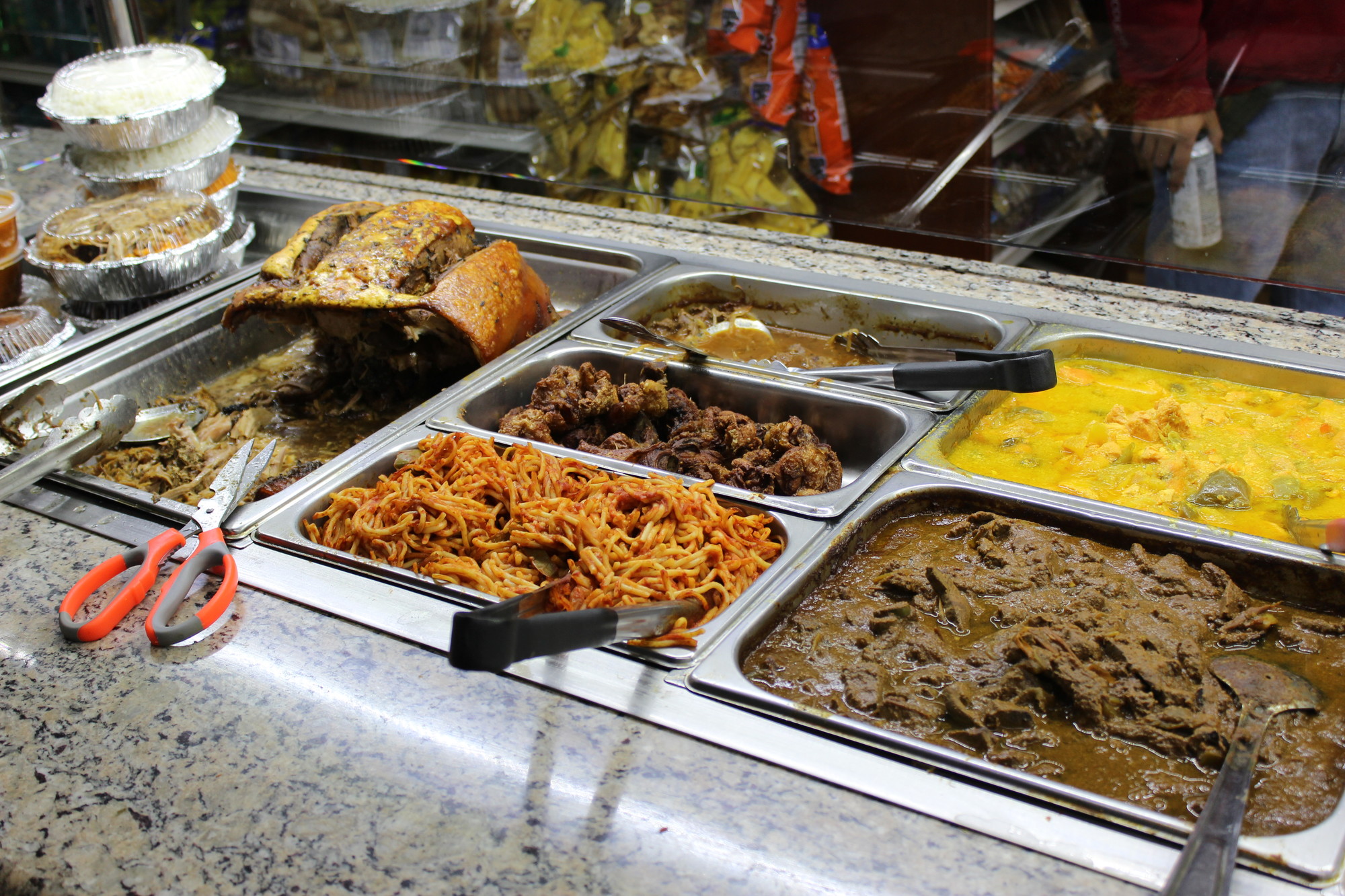 The deli primarily offers Dominican delicacies as well as baked chicken, spaghetti and roast pork.