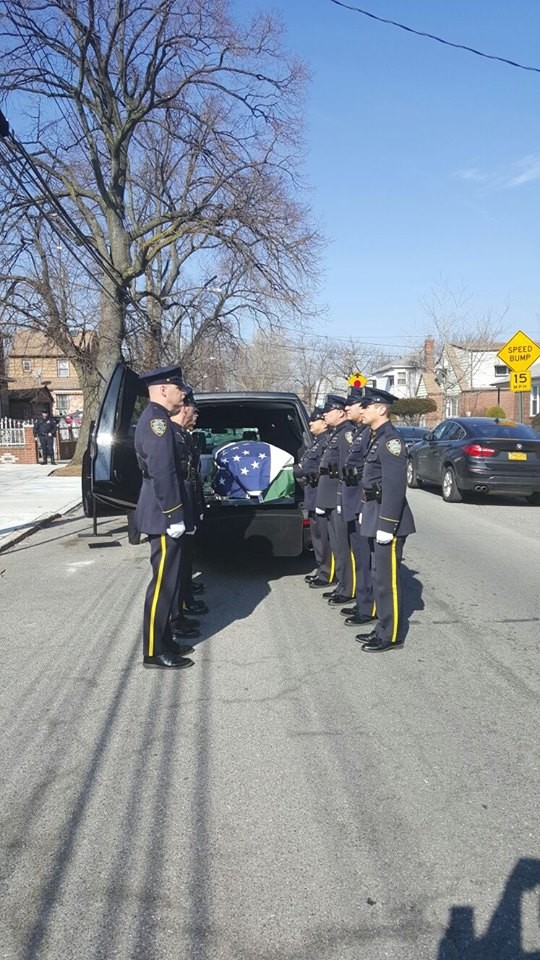 Fellow officers accompanied the casket of Vincent Harrison at Pinelawn Cemetery, in Farmingdale.