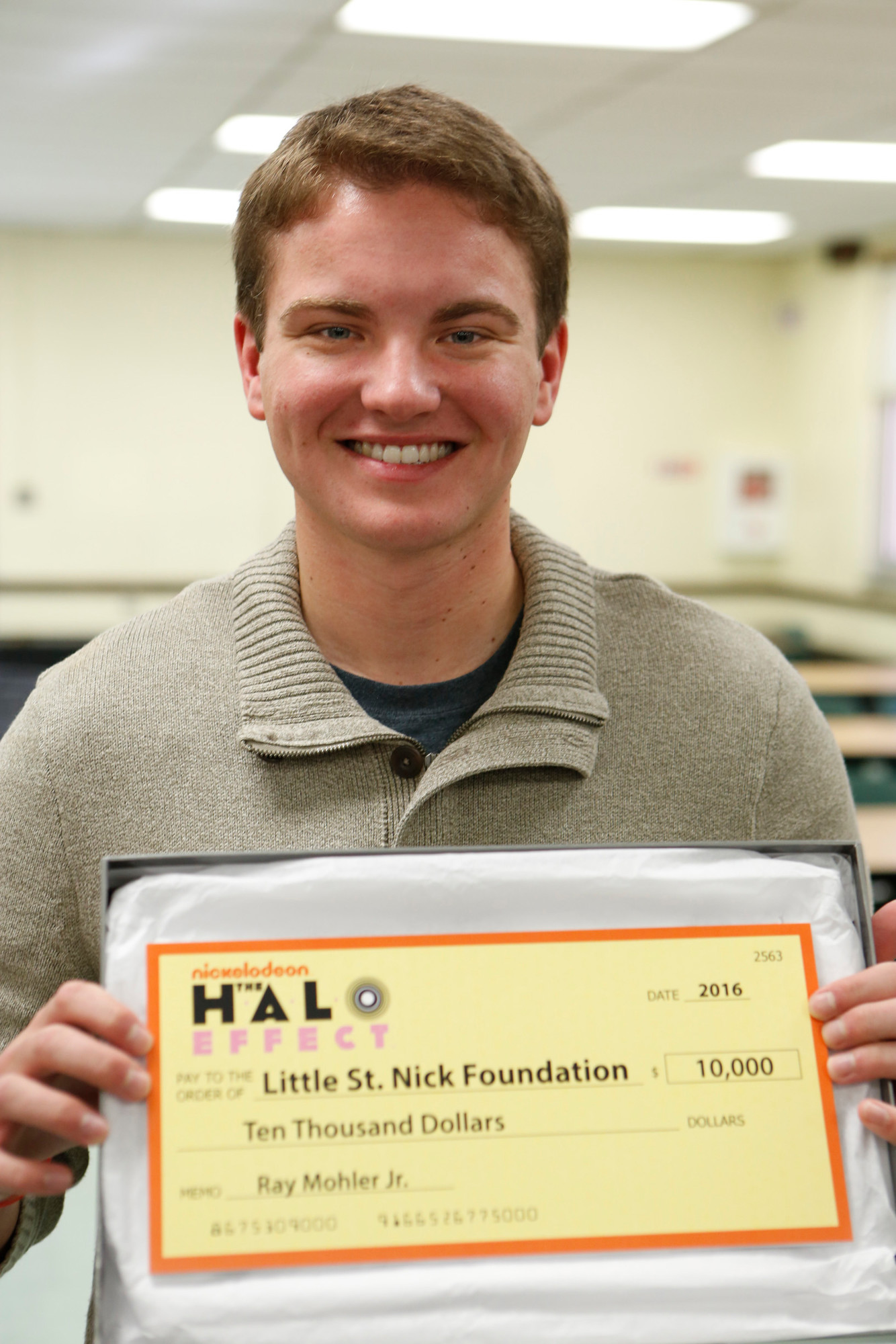 The host of Nickelodeon’s ‘The Halo Effect’
surprised Ray Mohler Jr. with a check for $10,000 for the Little Saint Nick organization.