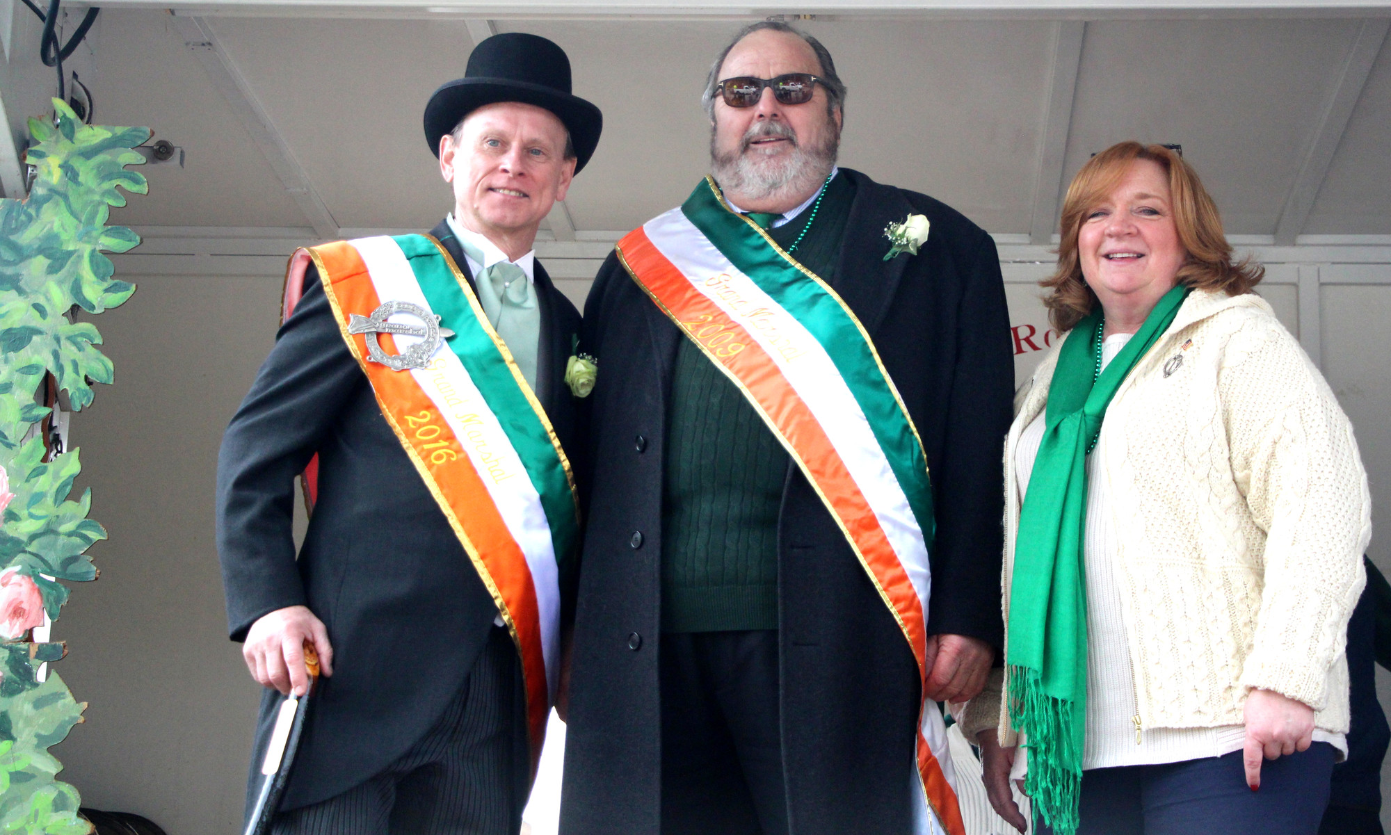 After leading the parade through the village, O’Reilly, left, joined Mayor Francis X. Murray and Deputy Mayor Nancy Howard on the reviewing stand.