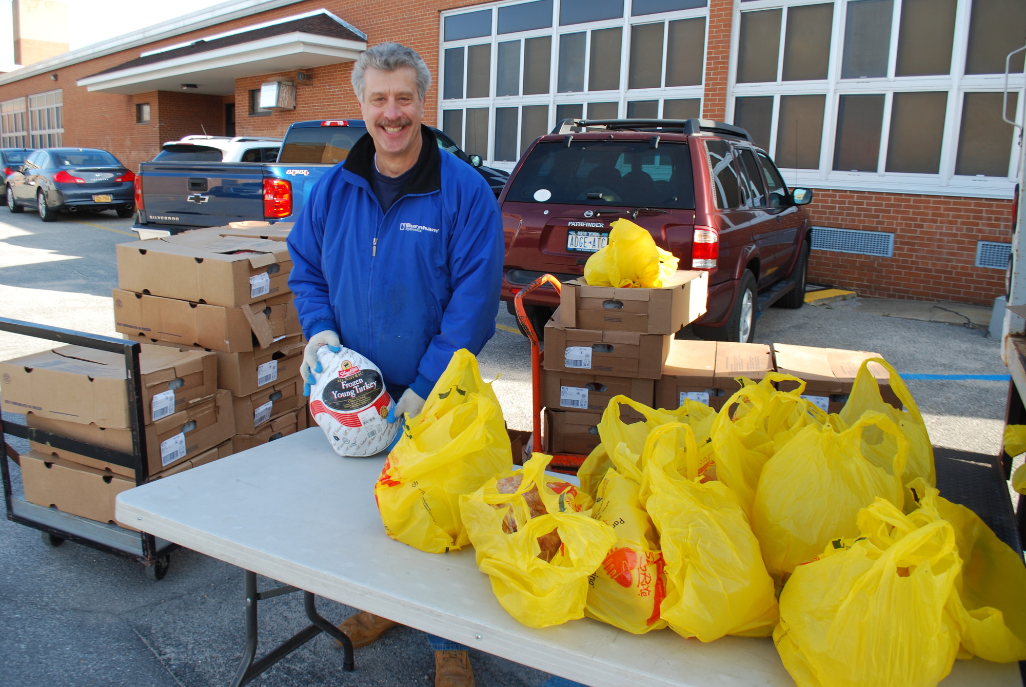 Holiday Food Drive Chairperson Jay Steinmetz packed up turkeys for local, needy families to enjoy on Easter Sunday.