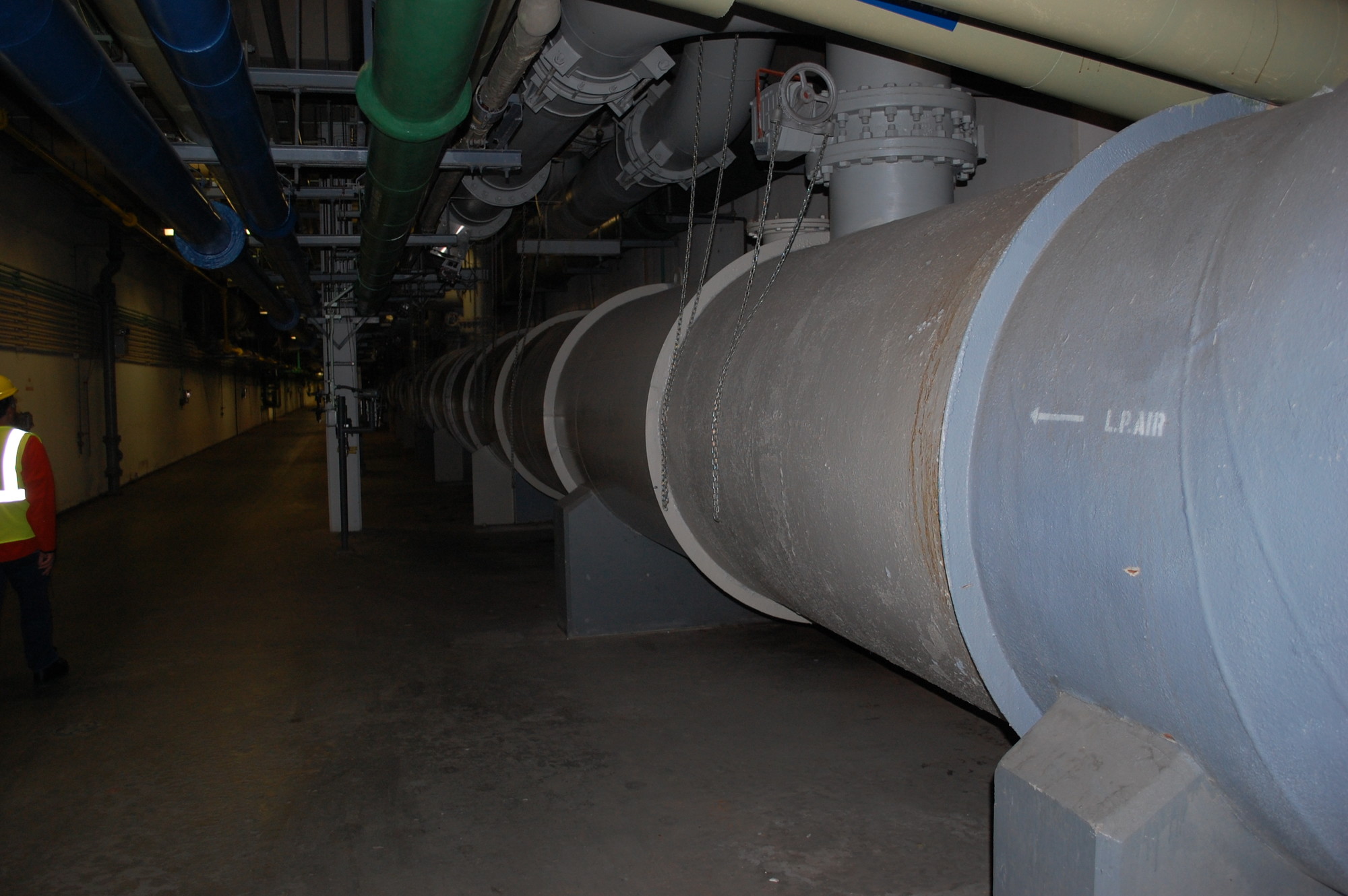 Large pipes provide aeration that keeps alive microorganisms which are used to break down the sewage.