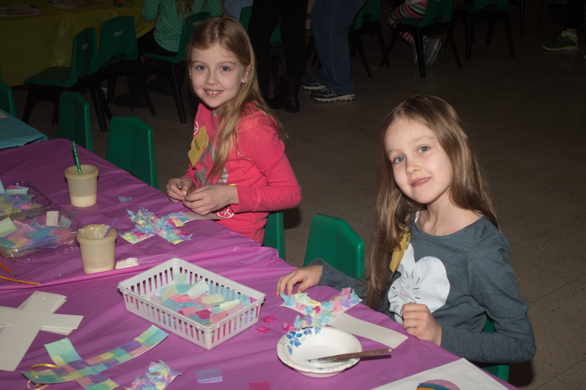 At the Easter party, Mckayla, 9, and Haily, 7, decorated crosses.