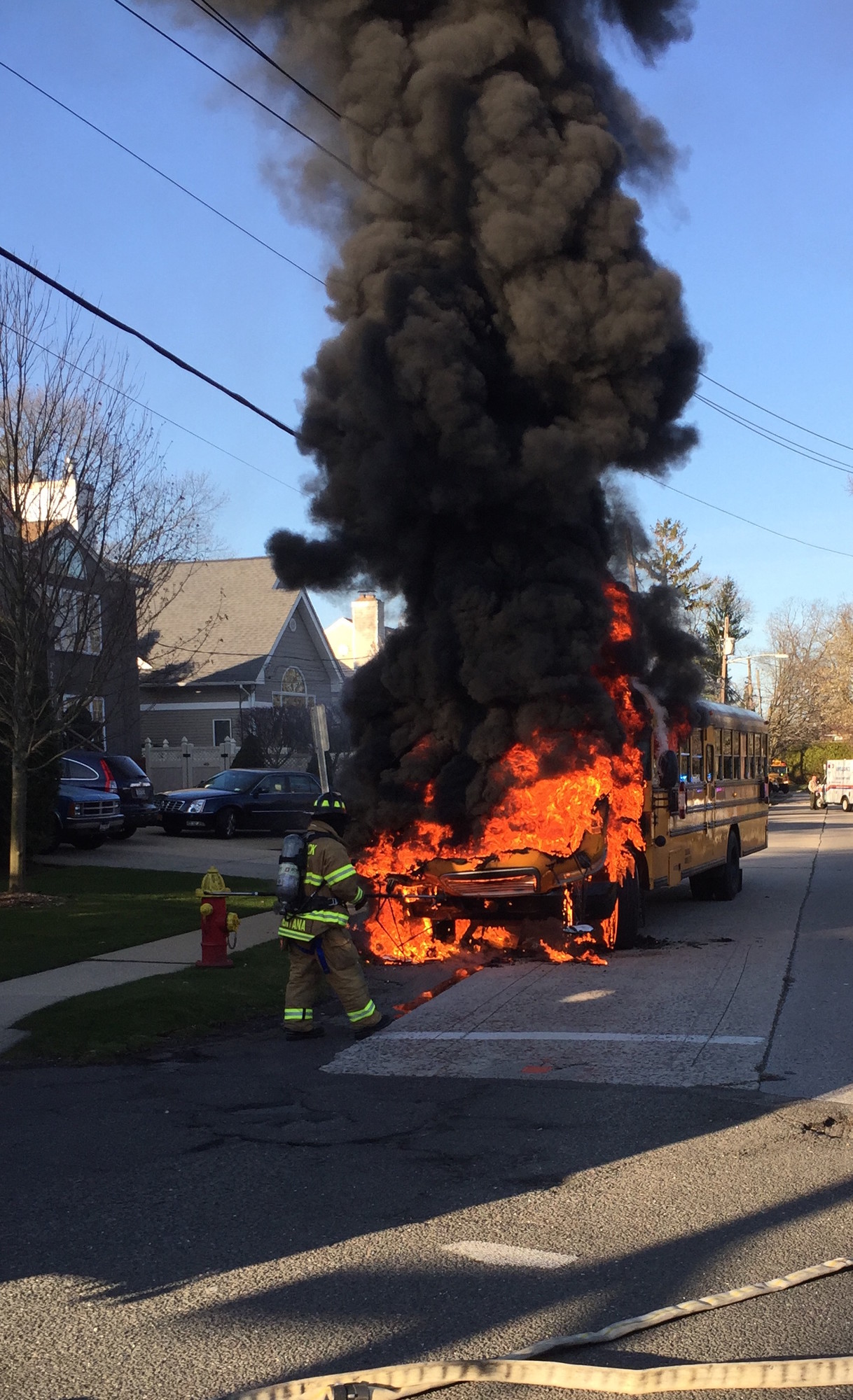 A school bus headed to Merrick Avenue Middle School suddenly caught fire and burst into flames on Kirkwood Avenue in Merrick on April 6. Photo courtesy Ron Luparello/Merrick F.D.