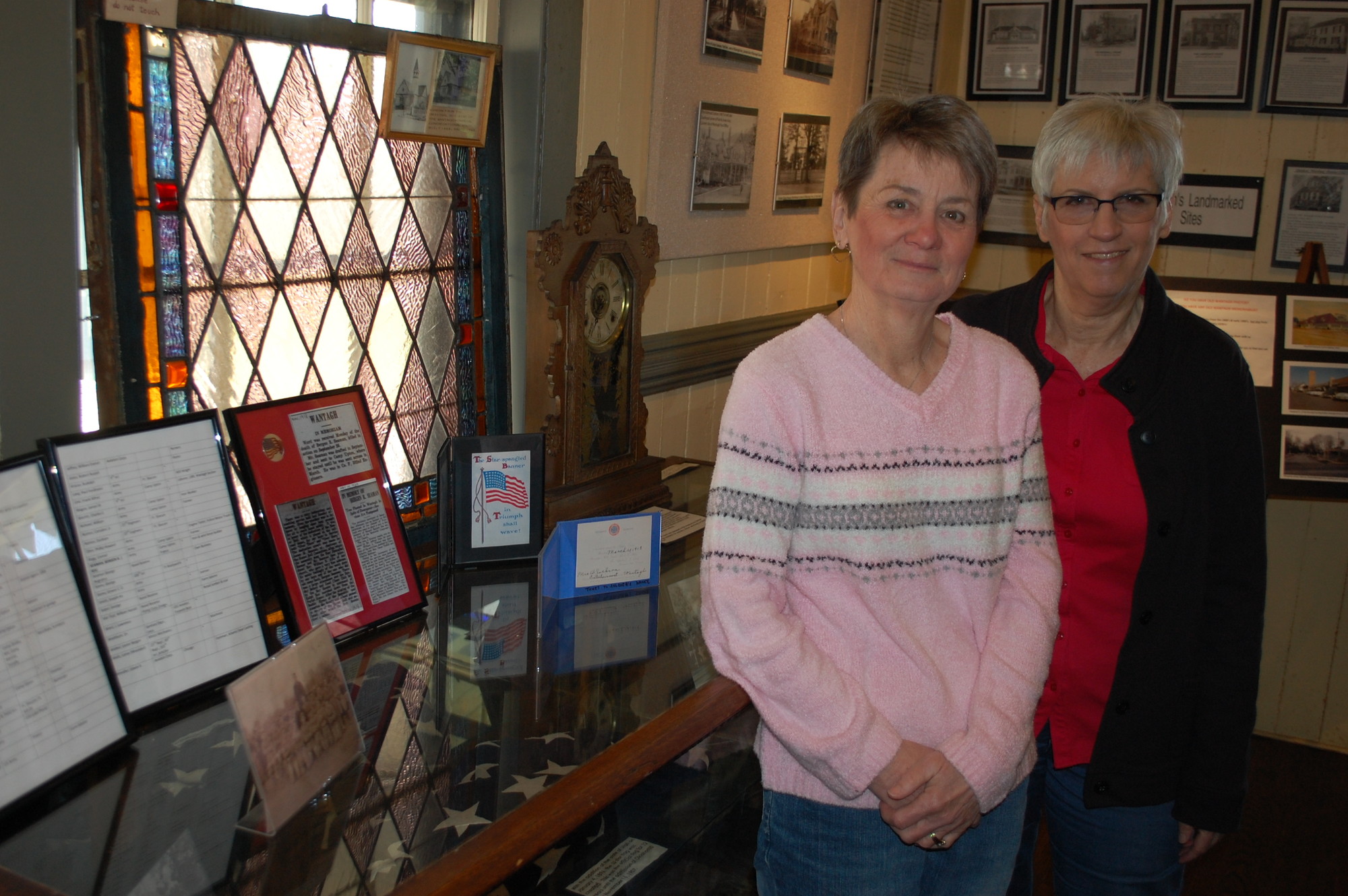 Claire Reisert, left, and Carol Poulos are among the volunteers from the Wantagh Preservation Society who give tours of the local history museum