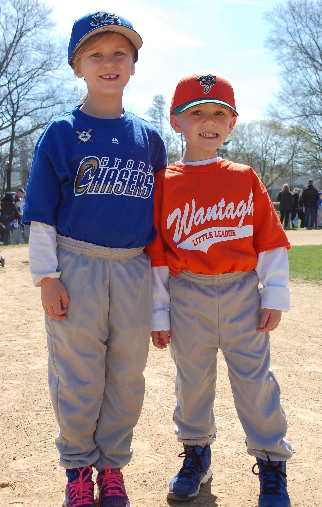 Siblings Maggie, 7, and James Kurz, 5, were excited for the start of the new baseball season.