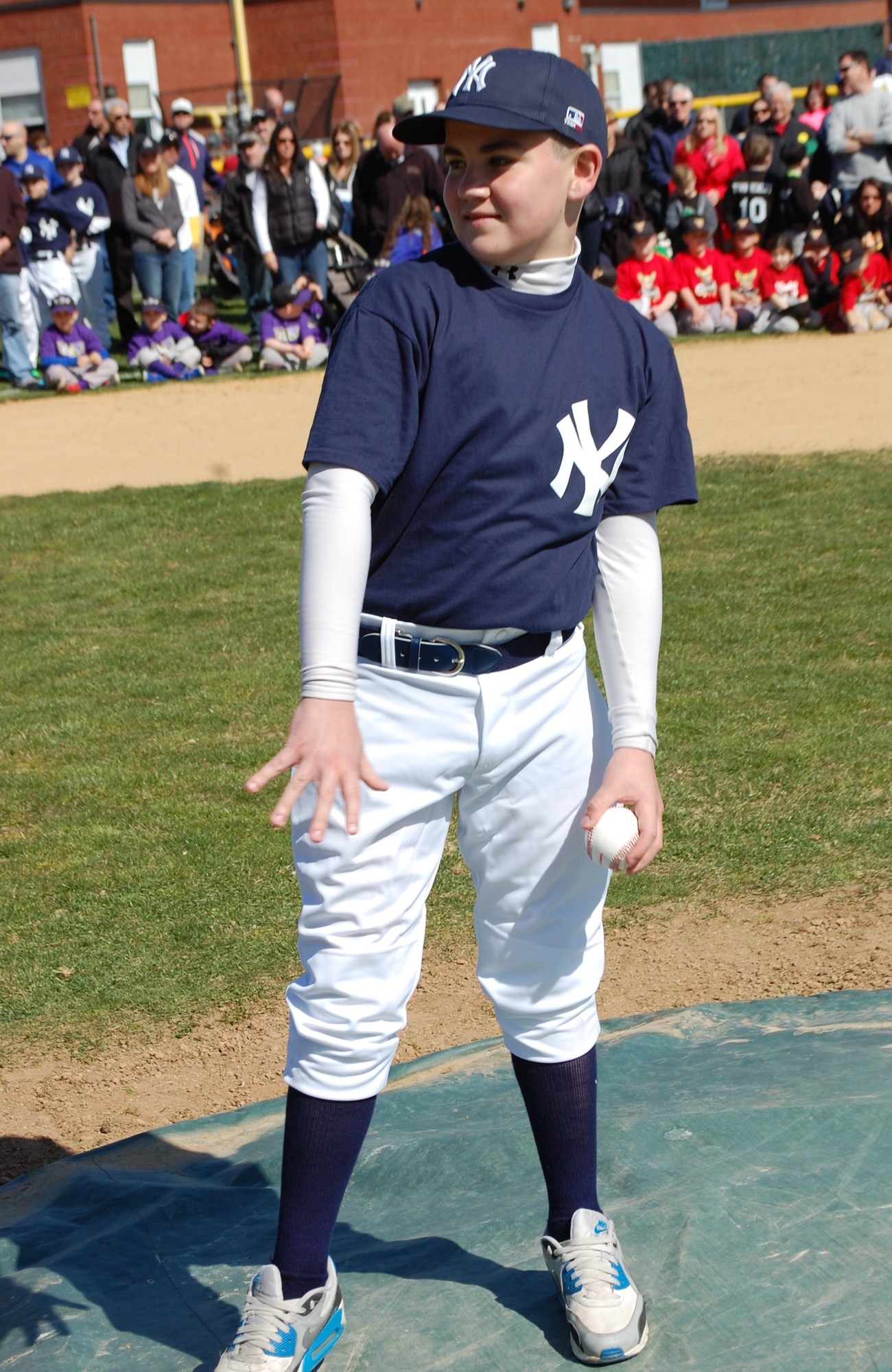 Yankee Liam Casey who threw out the ceremonial first pitch in honor of his late grandfather.
