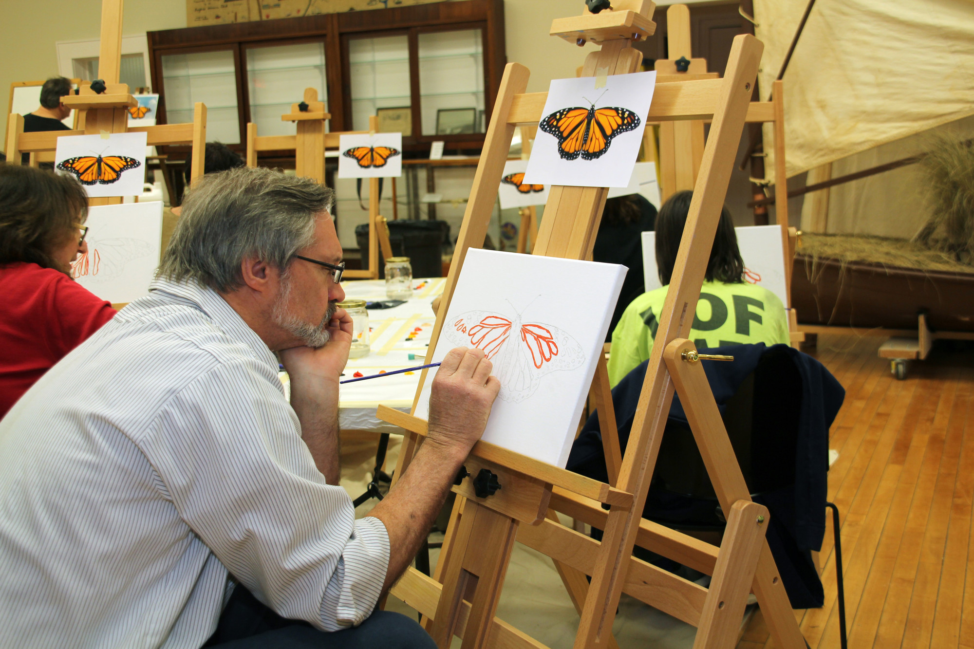 Mark Wurthmahn worked on his butterfly piece at Paint Night at the Museum on April 15, hosted by the Seaford Historical Society.