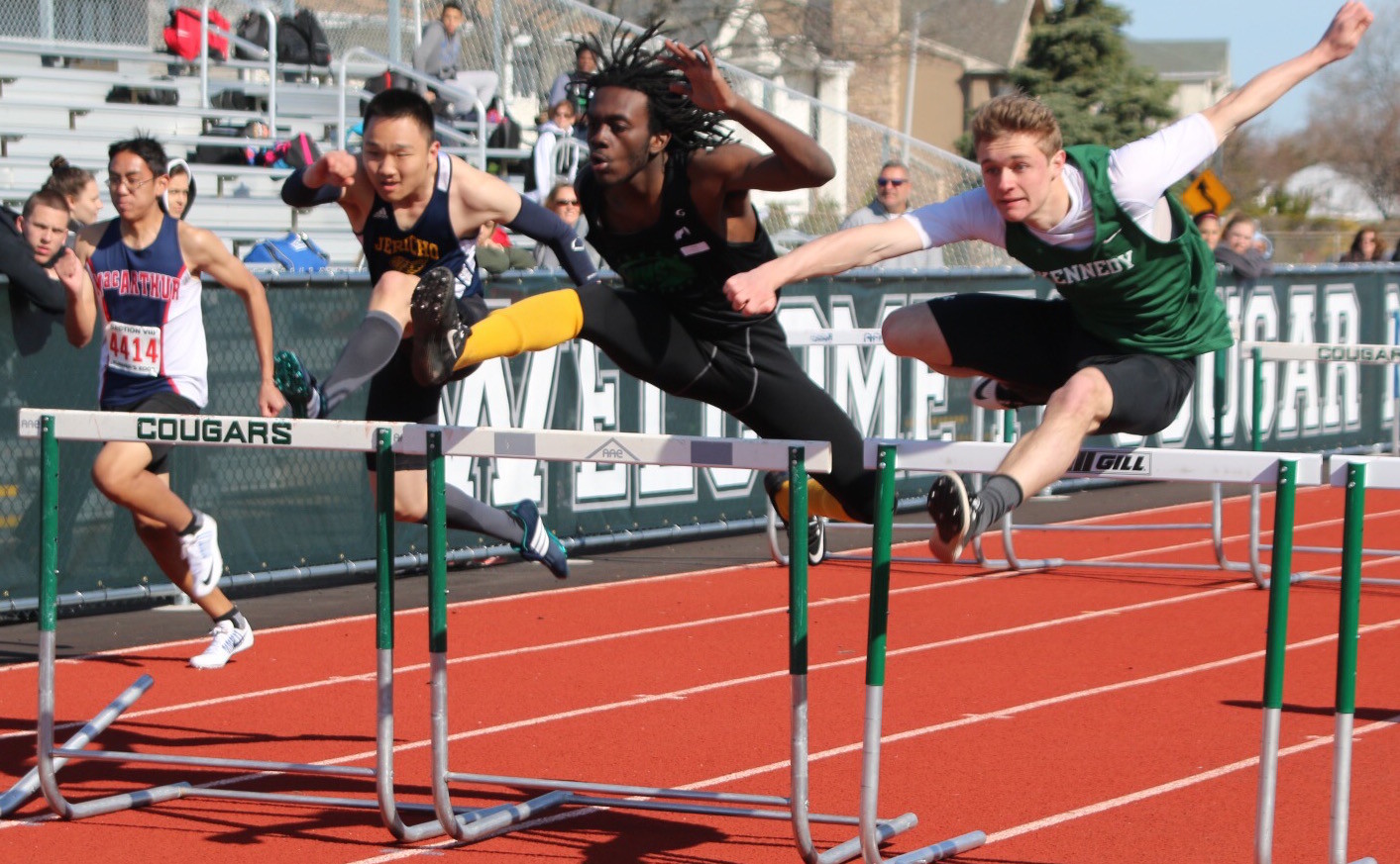Ryan Cummings, right, a Kennedy High School junior, competed in the hurdles at the annual Cougar Invite last Saturday. The photographer, William Sasson, is a Kennedy junior and member of the track team.