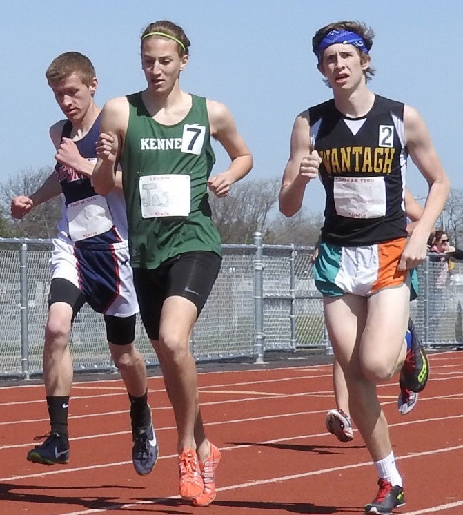 Kennedy senior Jack Ostrofsky, center, ran the Cougar 3200, a grueling, fast-paced 3,200-meter race in which the last runner in each lap is eliminated until there are only two. The photographer, Alexandra Brinton, is a Kennedy sophomore and member of the track team.