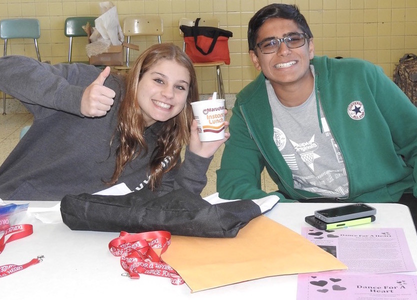 Kennedy freshmen Alli Dippolitto and Ahmed Bendary, both members of the track team, volunteered at the meet.