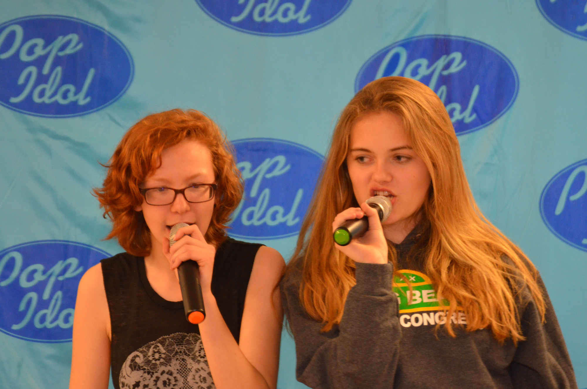 Long Beach High School students Leah Cohen and Ali Thursland performed some karaoke for the crowd at Long Beach AWARE’s Teen Nite Out event on April 15. Photos by Tim Baker/Herald