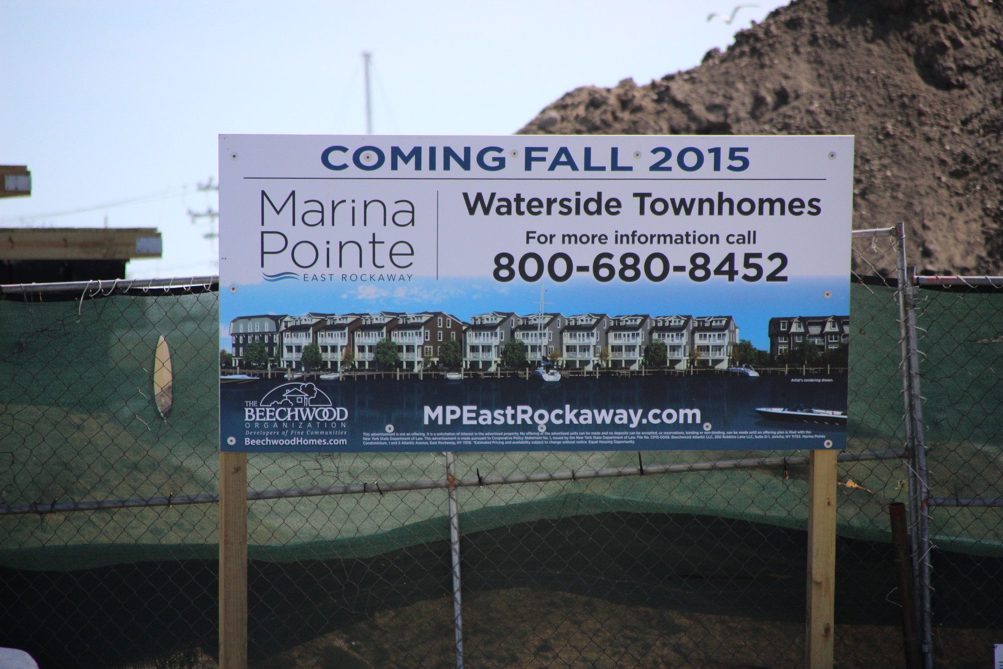 The grading of the site is being raised to make the development storm resilient. (the sign should read ‘2016.’)