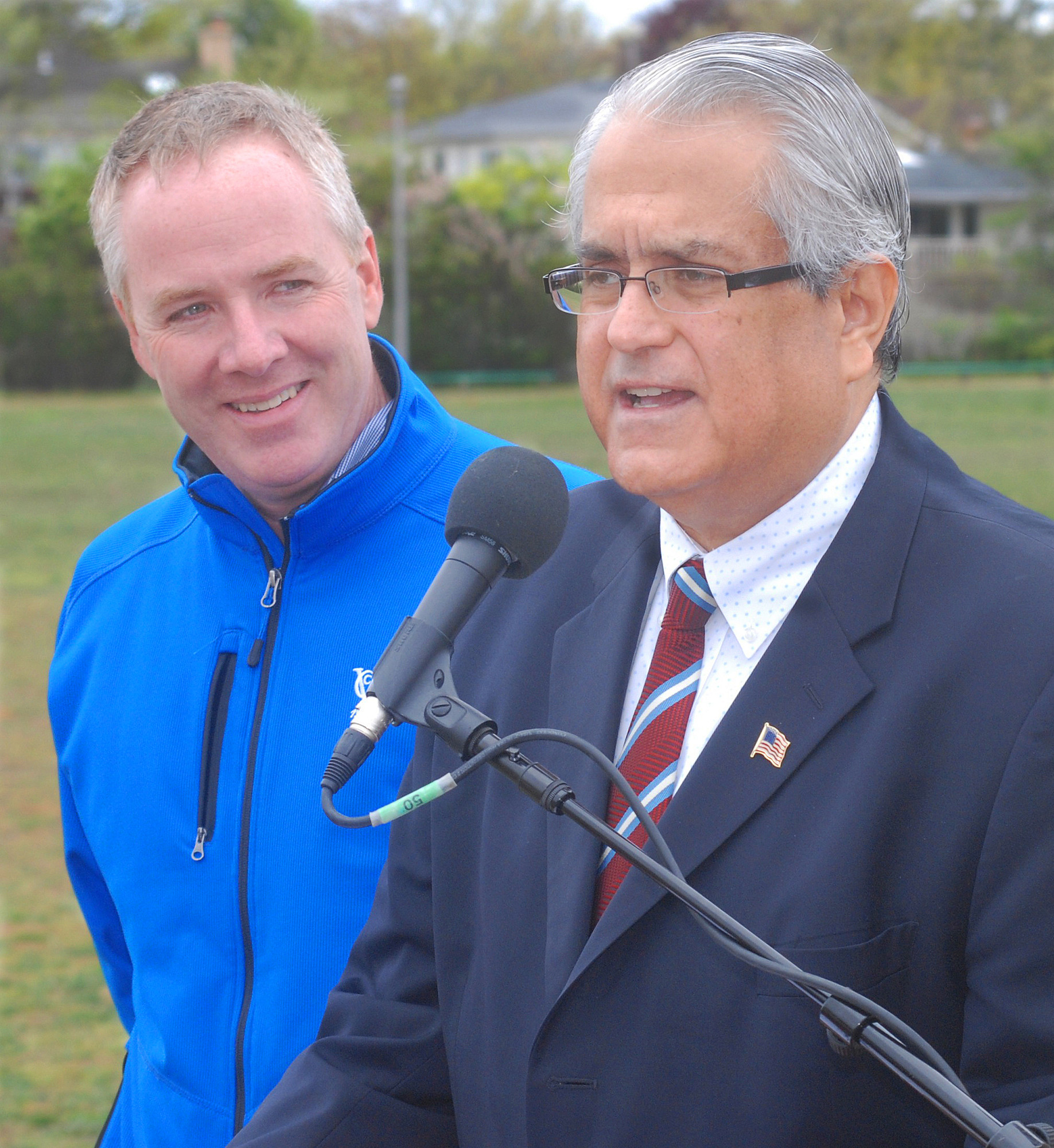 Town Supervisor Anthony Santino, right, made the dog park announcement on a windy Thursday morning. He was joined by Receiver of Taxes Donald Clavin.