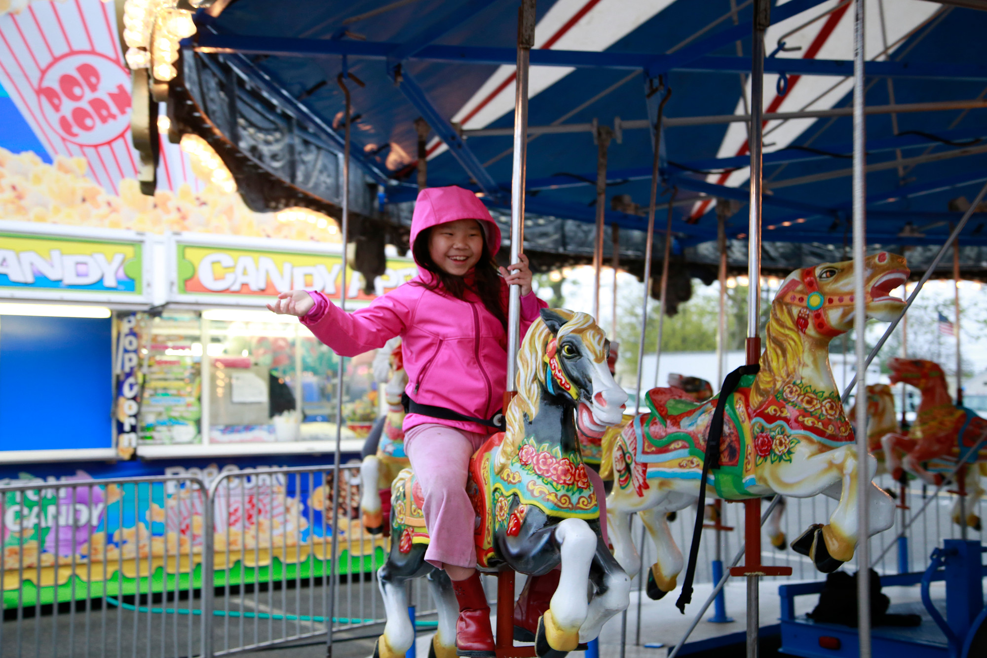 9-year-old Amanda Chou couldn’t help but smile as she rode the carousel.