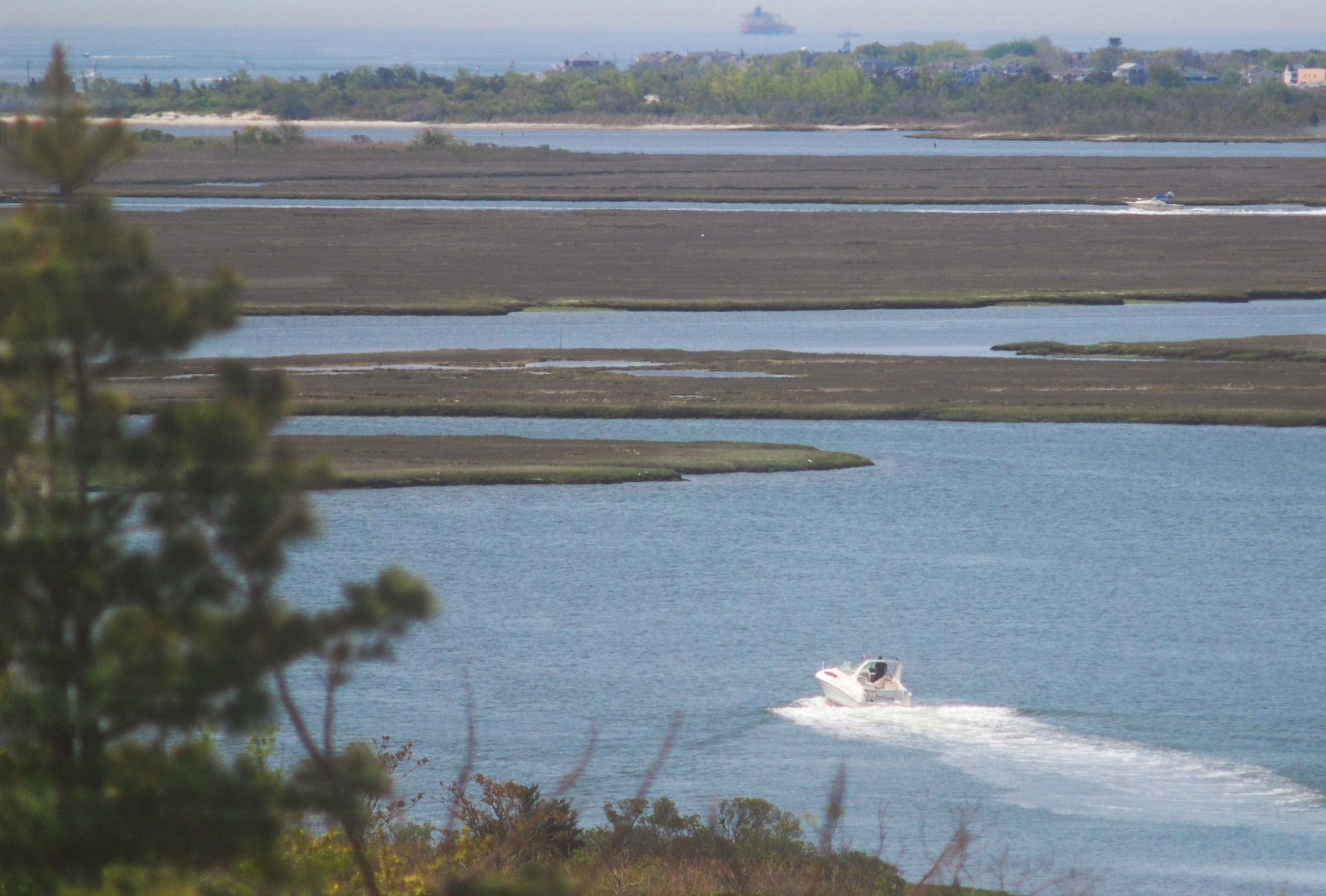 Nassau County has sent treated sewage into Reynolds Channel and the Western Bays since the late 1940s. A new county plan to divert the effluent to an ocean outfall pipe would end the practice, which would improve water quality in the bays, environmental experts say. Above, a view of the bays from the Town of Hempstead’s Norman J. Levy Park and Preserve in Merrick. Photo by Scott Brinton/Herald
