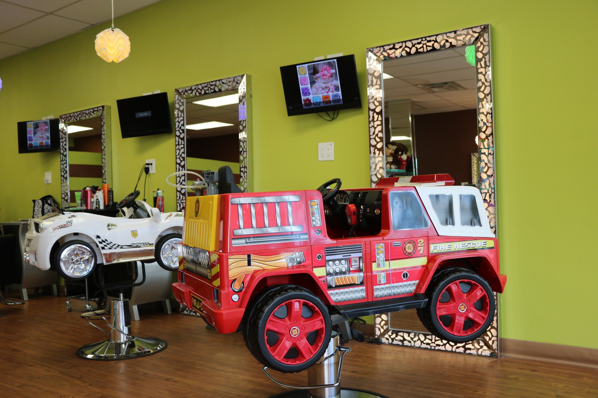 Being the driver of a fire truck or race car is just one of the joys of getting your haircut at the Fun Salon in West Hempstead.