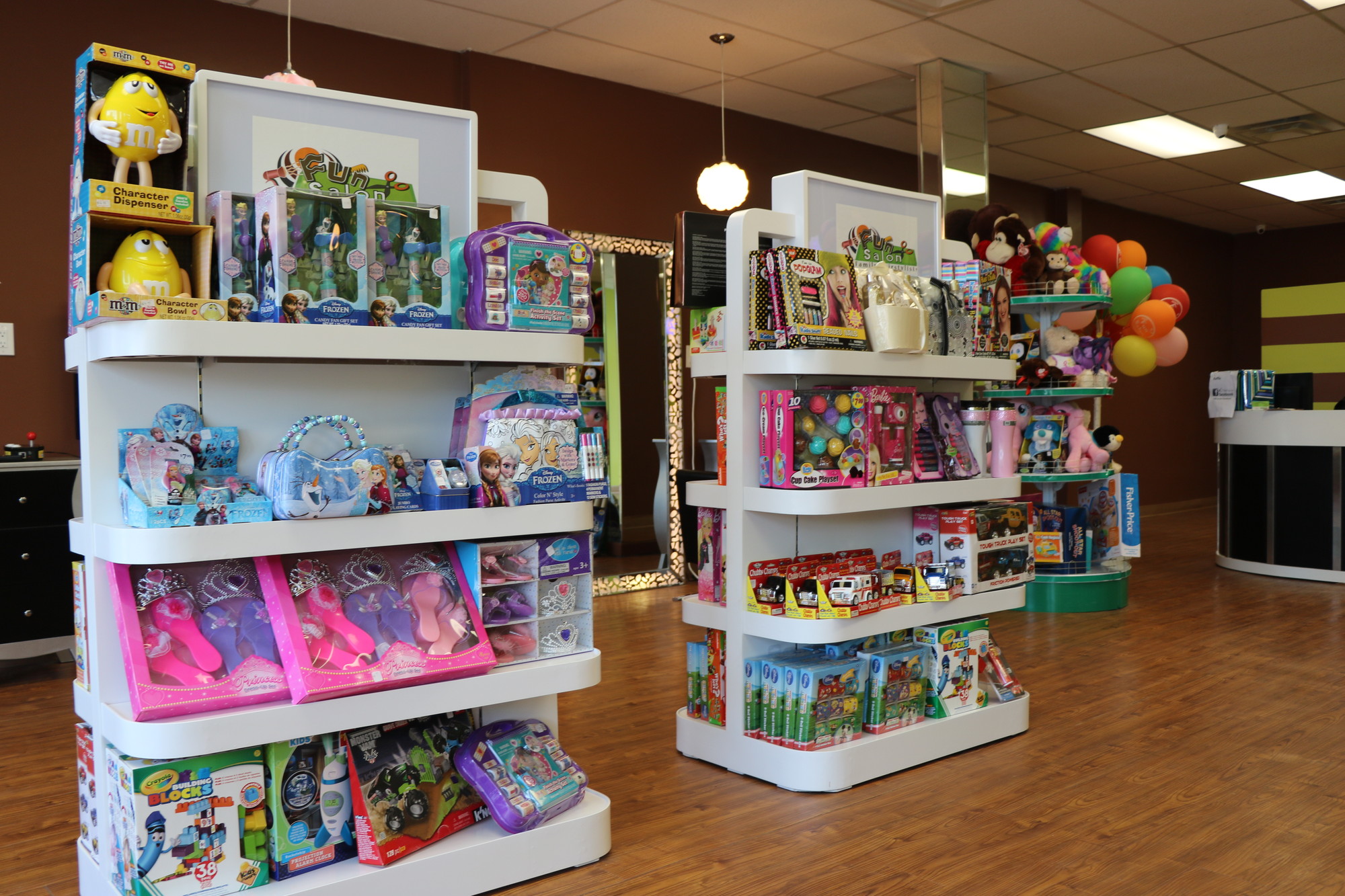 Toys fill the main floor of the salon, adding to the kiddie appeal.