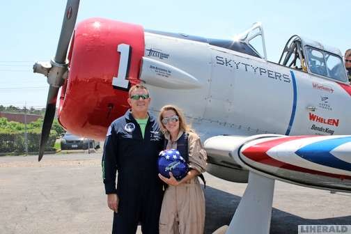 Pilot Larry Arken and Christina Daly after their flight.