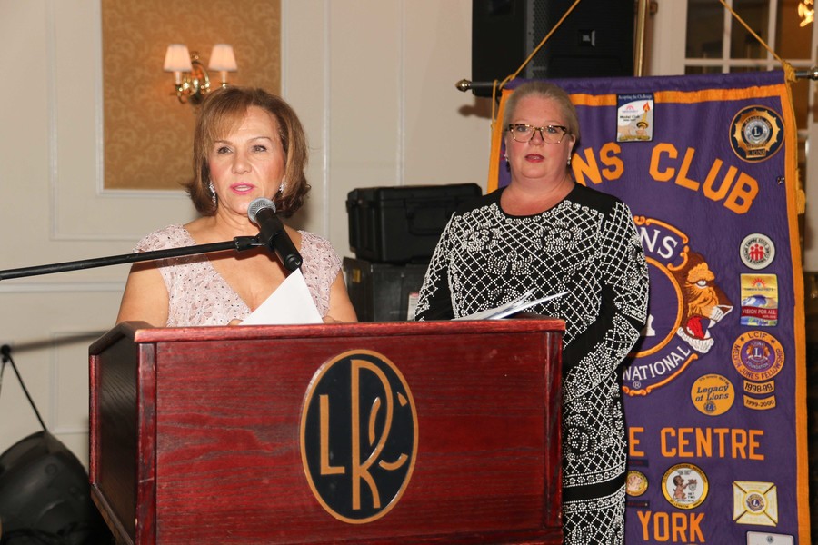 Event Organizer Joan MacNaughton, at left, and MC Barbara Ann Dillon addressed the guests.