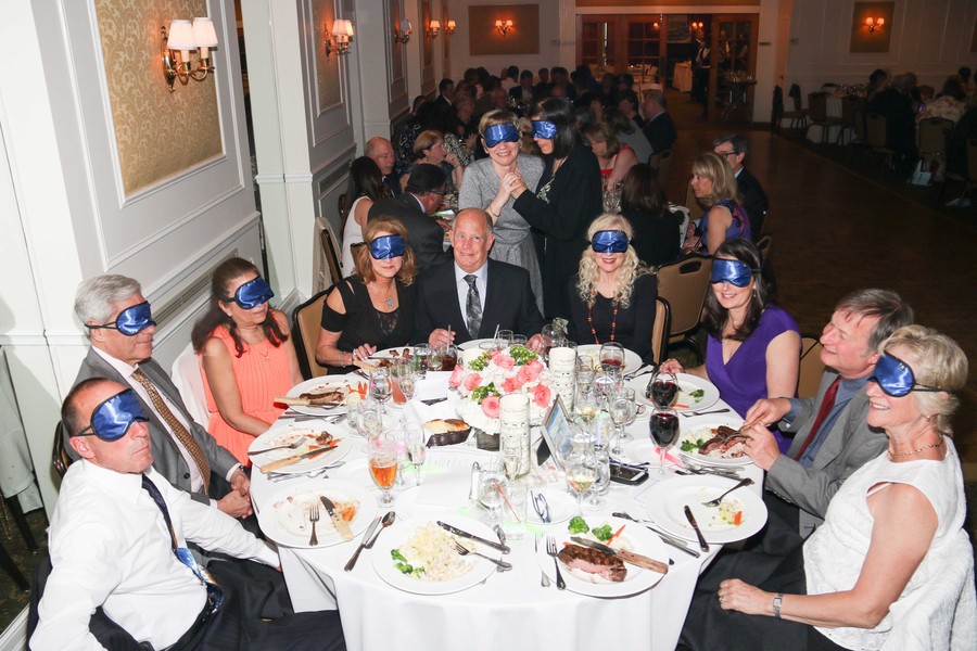 Dinner guests ate their meals while blindfolded to see what it is like to live with visual impairments.