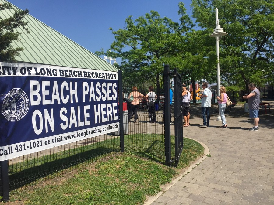 Residents waited on long lines at the Recreation Center and other locations throughout the weekend to purchase beach passes.