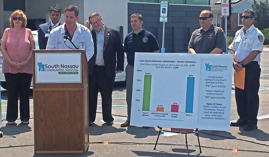 Dr. Joshua Kugler, joined by County Legislator Denise Ford, City Manager Jack Schnirman, Fire Commissioner Scott Kemins and other officials, announced the results of the survey on May 26. Photo by Tyler Marko/Herald