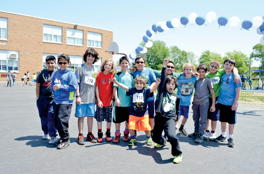 Fifth graders at Polk Street School showed their excitement for the walk/run.