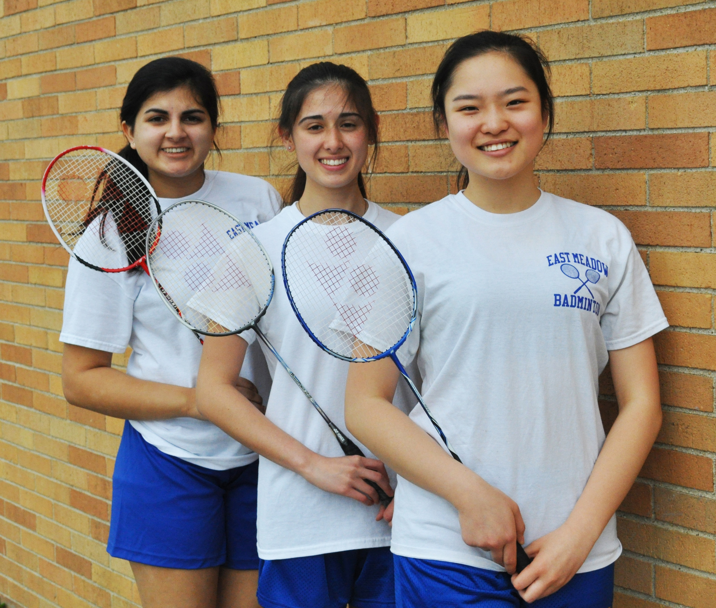 Lady Jets' standout singles players, from left, Nikita Khosla, Alicia Gonzalez and Lily Lin led East Meadow to repeat as conference champion.
