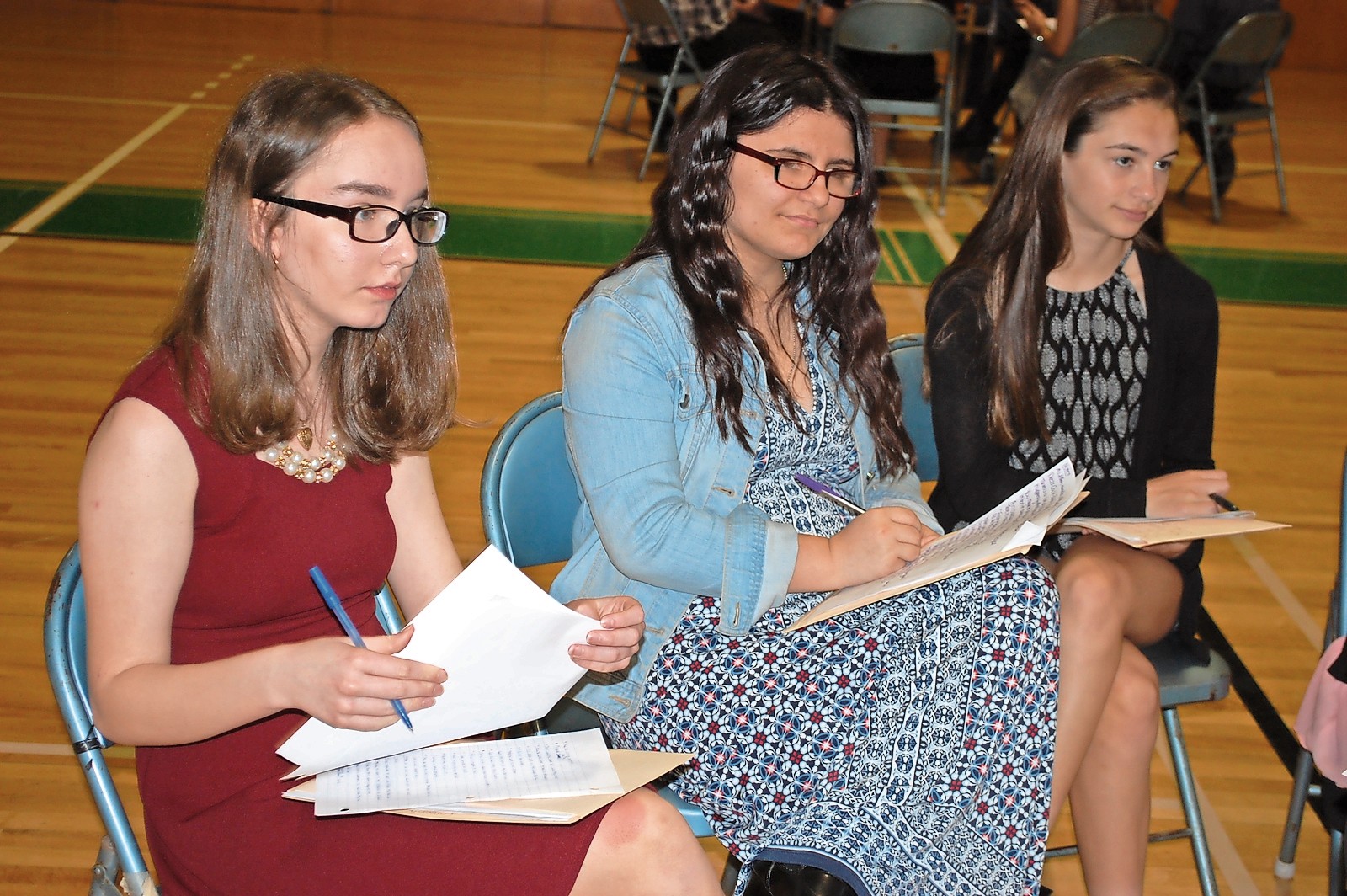 Eighth-graders, from left, Taylor Prestia, Grace Saletto and Jessica Del Signore learned about various career choices.
