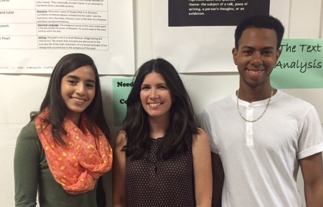 Central High School students, at left, Samiris Feliz, the third honorable mention winner, and second place winner Jalani Johnson, at right, were congratulated by Central’s English chairperson, Lauren Cote.