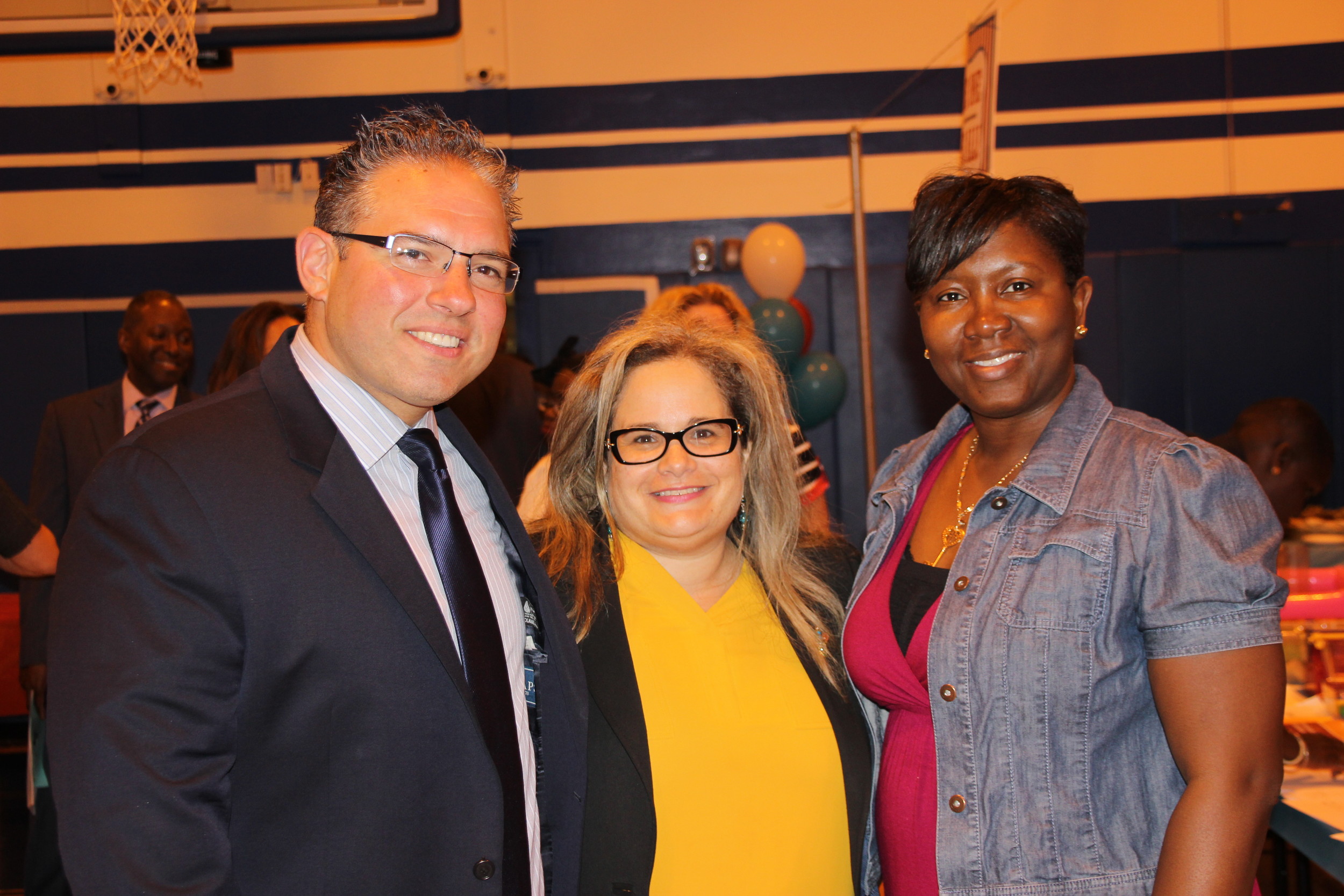 Shaw Avenue Assistant Principal Christopher Colarossi, at left, Director of Special Services Nicole Schimpf and District 30 parent Andrea Morris-Abrahams mingled with parents and faculty.