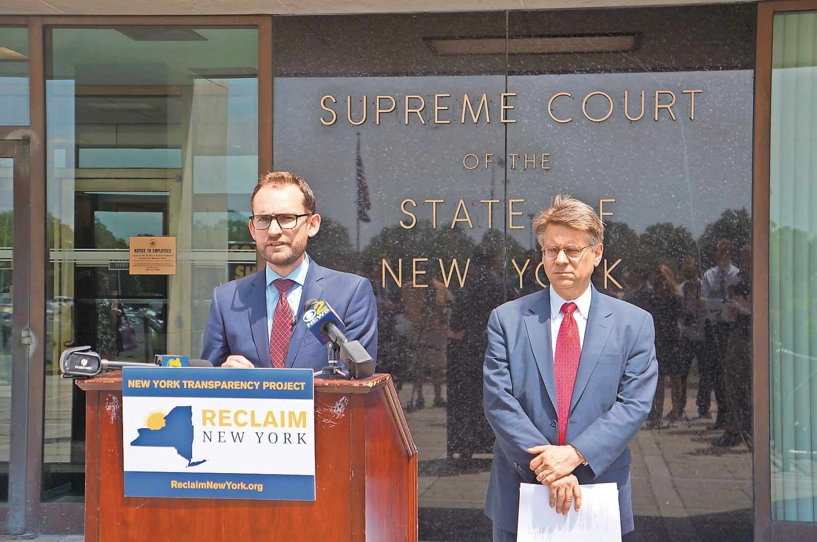 Reclaim New York Executive Director Brandon Muir, left, and attorney Dennis J. Saffran discussed the New York Transparency Project on Tuesday in Mineola.