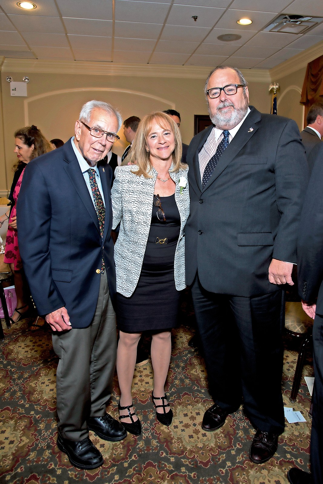 Martha Krisel, center, with former mayor Gene Murray and Mayor Francis X. Murray.