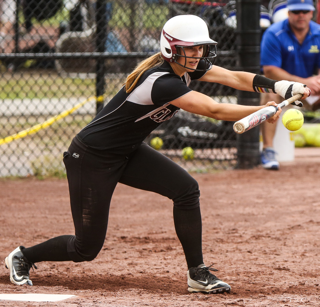 Clarke’s Brooke Scherer, limited by a broken thumb suffered in the Nassau County finals against Carey, had a bunt single and scored in the fourth inning of the state Class A championship game.