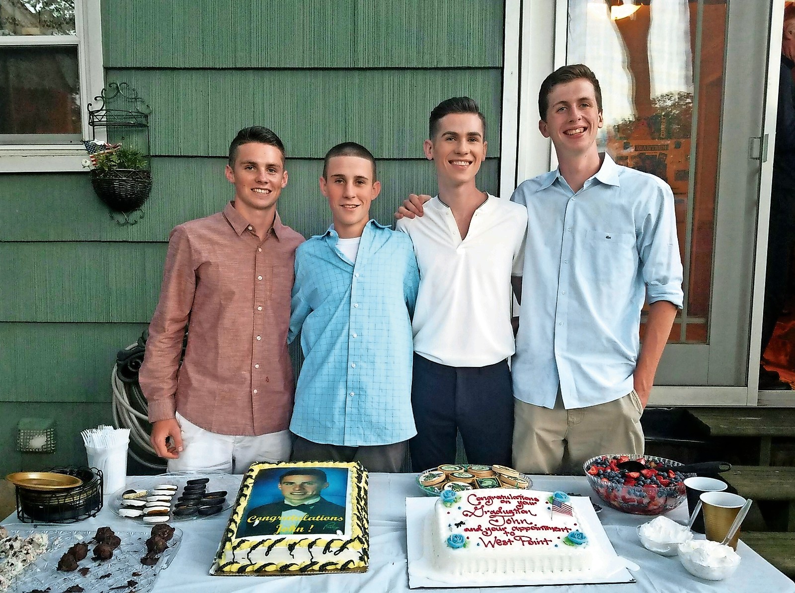 Future West Point cadet John Burke, far left, was joined by his brothers Mikey, Matt and Tom at his going-away party last weekend.