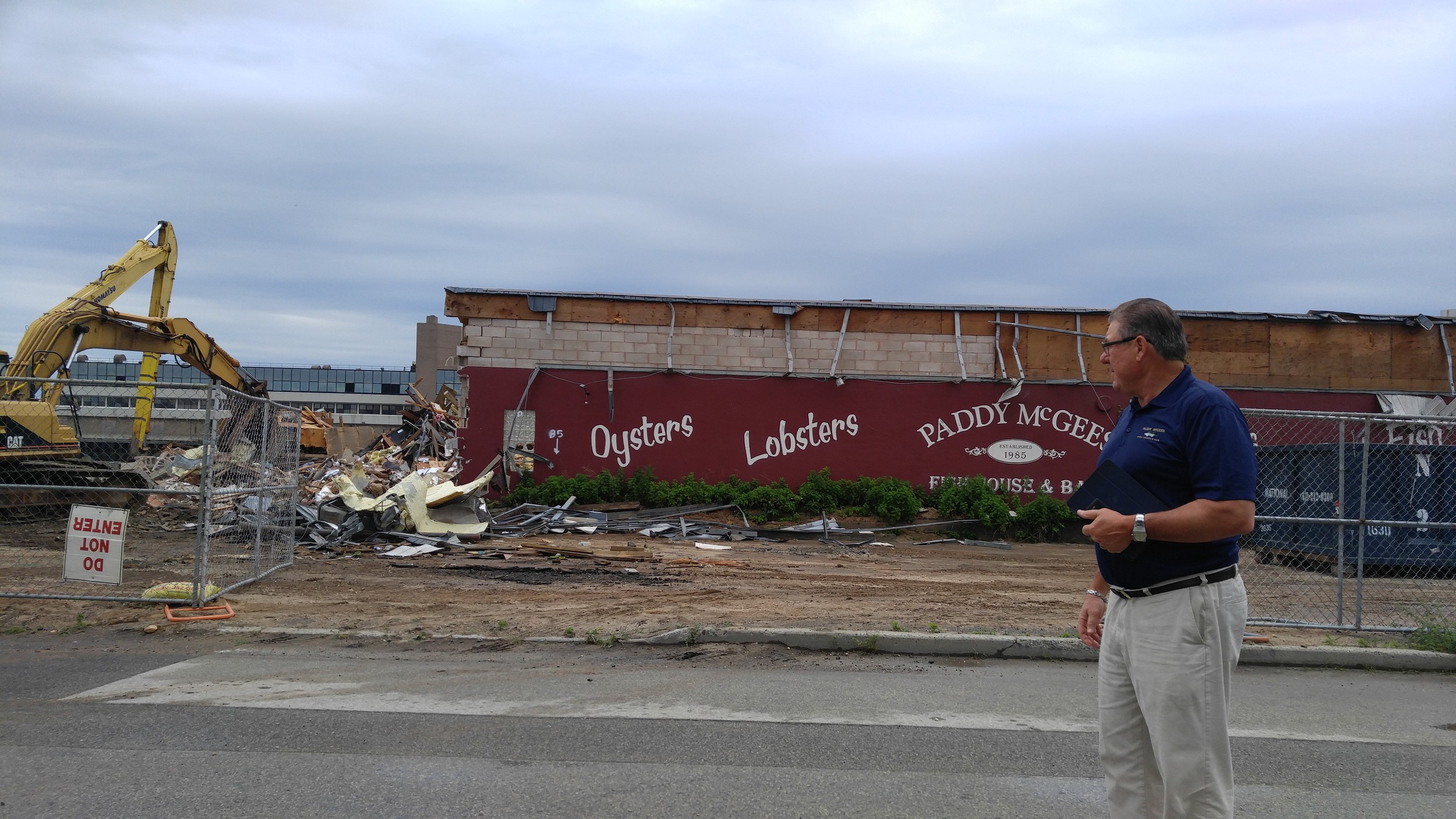 John Vitale watching the destruction of his landmark Paddy McGee’s Restaurant.