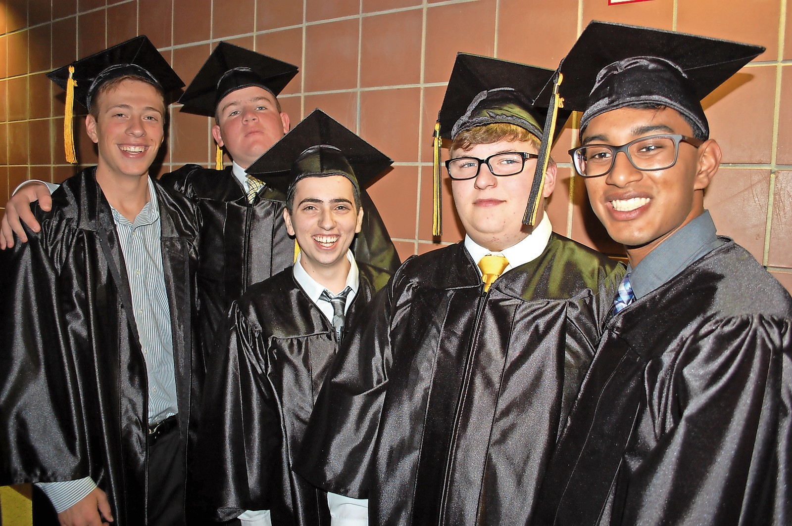 Wantagh High School graduates, from left, Jonathan Tanner, Brendan von Runnen, Emmanuel Yacobov, Alexander Stein and Osama Teepu were part of the school’s 61st class.