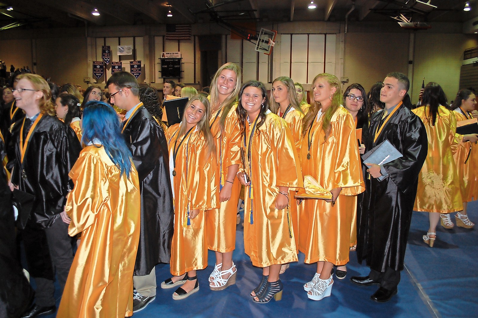 Graduates were all smiles after getting their diplomas.