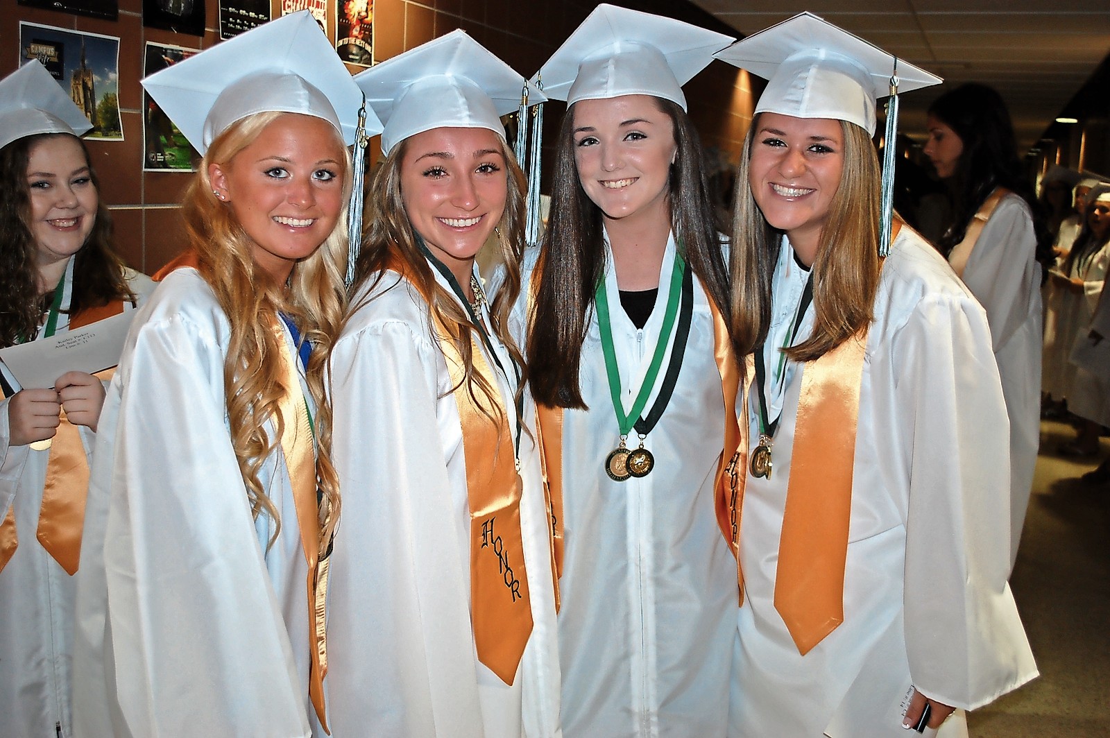 Seaford graduates, from left, Jennfier Hughes, Ashley Casazza, Erin Russell and Molly Van Dusen awaited the start of the ceremony.