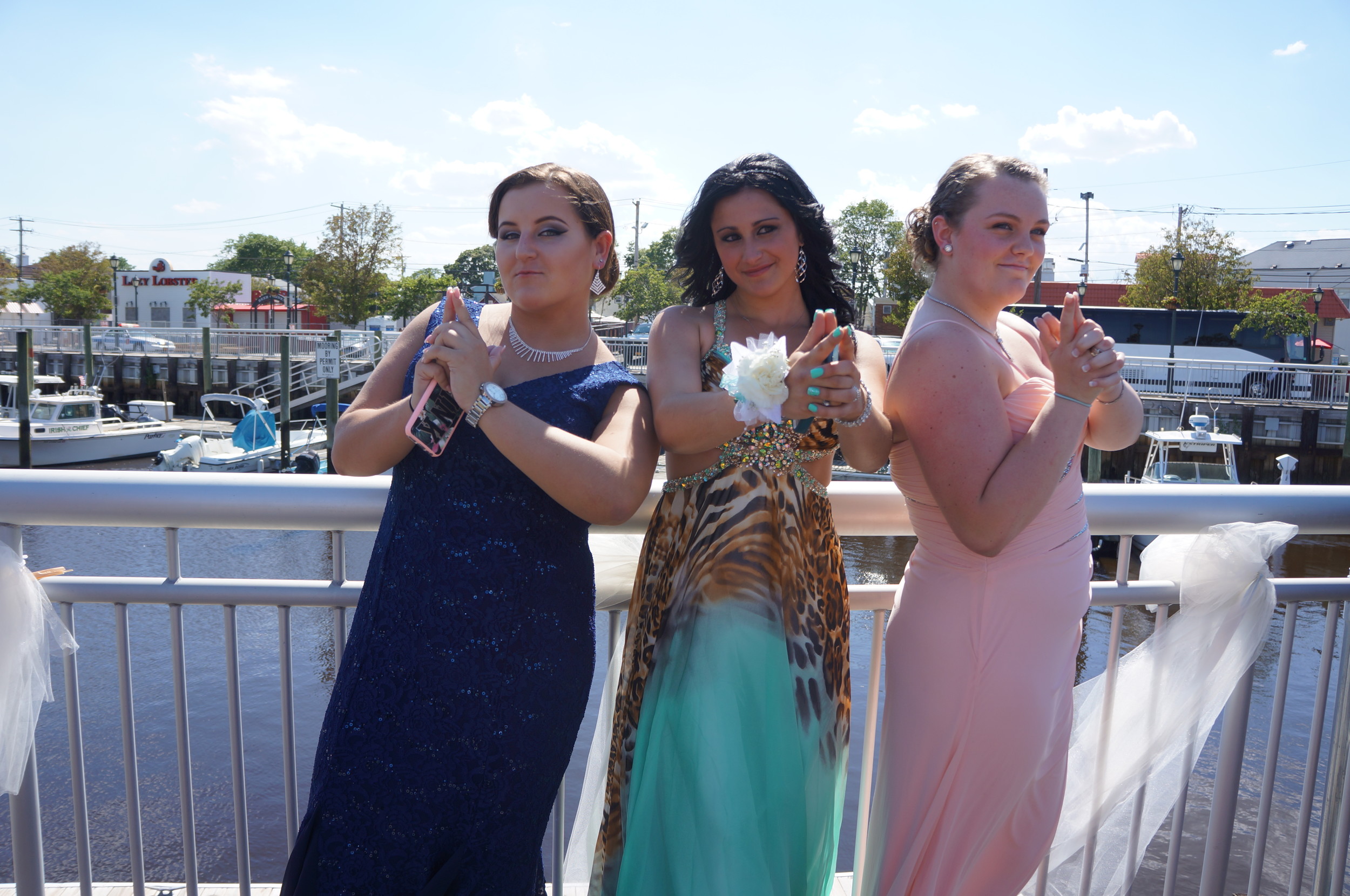 Brittany Dantona, Brianna Ritter and Erin Woehling struck a “Charlie’s Angels” pose before leaving for the prom.