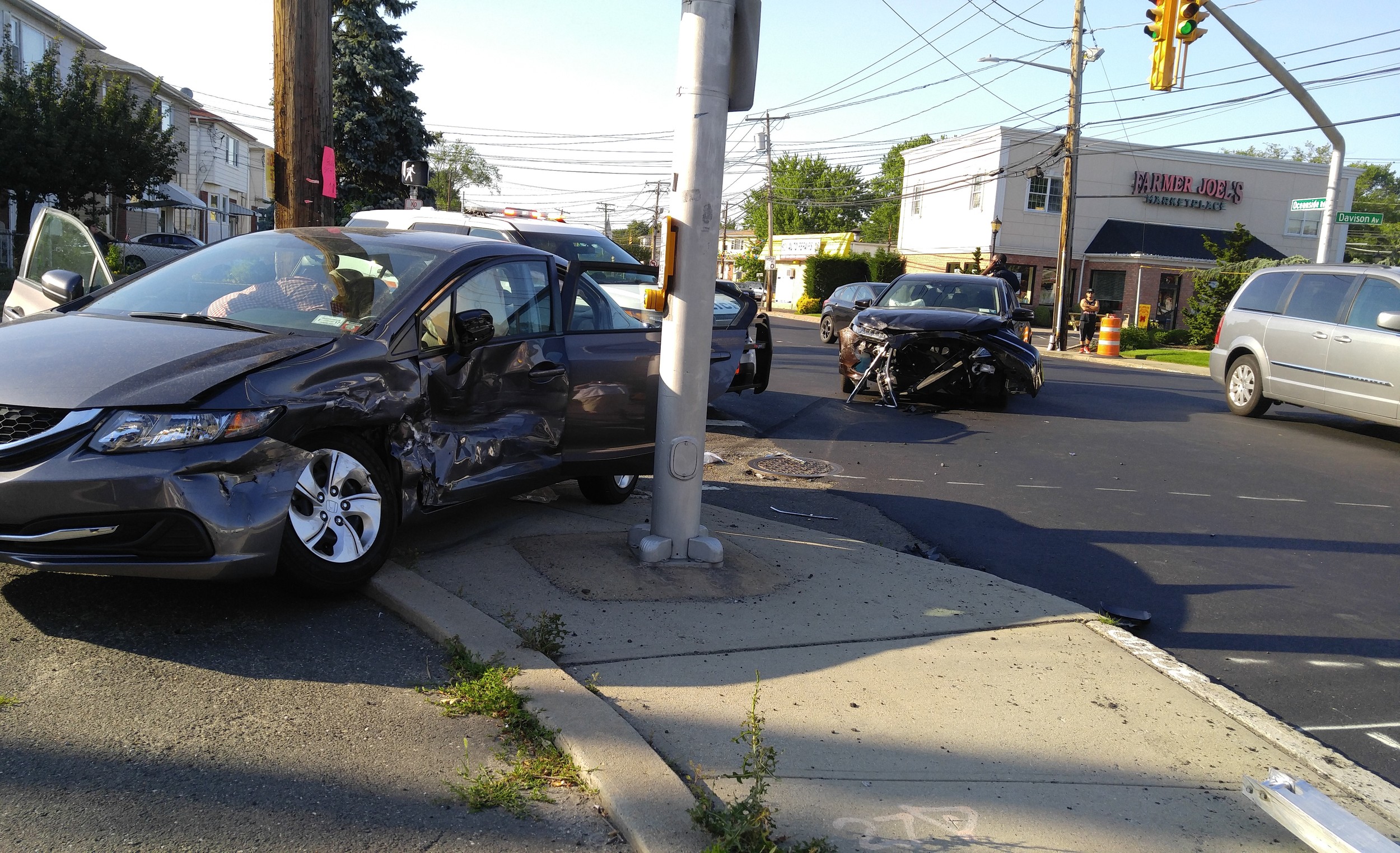An accident at the intersection of Davison Avenue and Oceanside Road left four people injured.