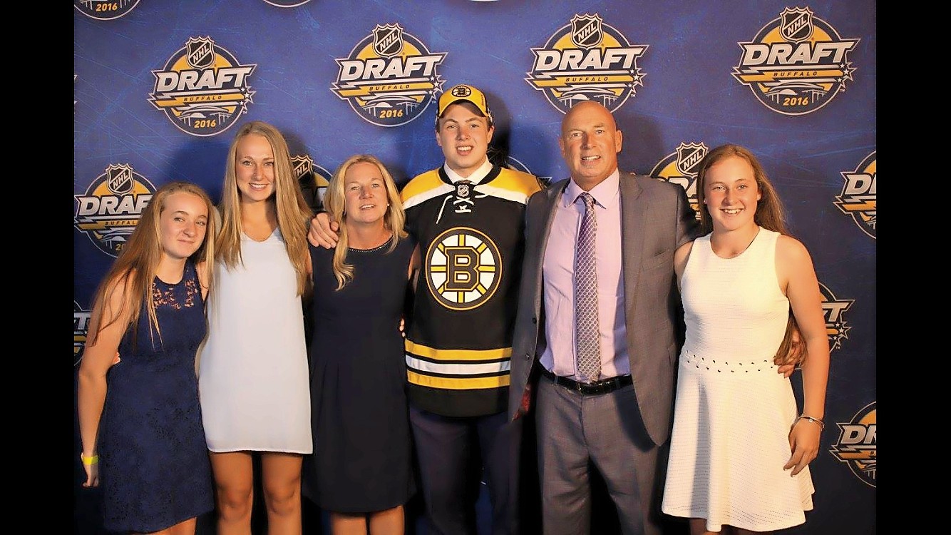 Charlie McAvoy with his family — Holly, left; Kayla; his parents, Jennifer and Charlie Sr.; and Heather — after his selection in the NHL draft in Buffalo last Friday.