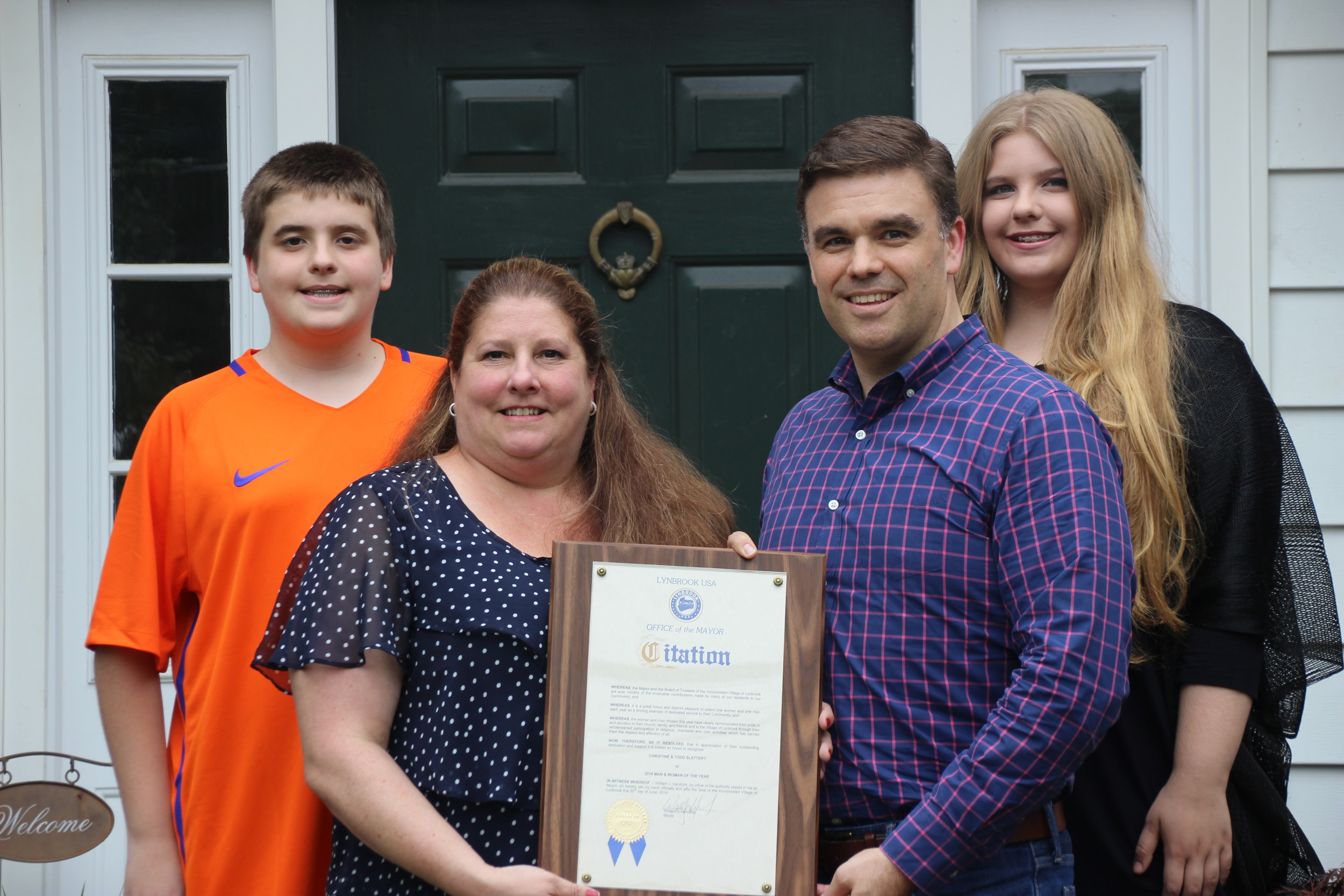 Mayor Bill Hendrick presented Todd and Christine Slattery with a citation declaring them as the 2016 Lynbrook Man and Woman of the Year on June 20.