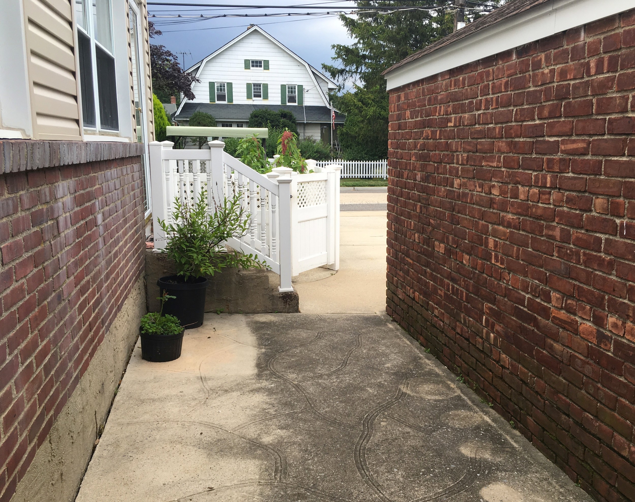 The area of Seby Oliveri's backyard, where Justin Hay hid from police after stealing a shotgun and bulletproof vest from a parked vehicle in Lynbrook.