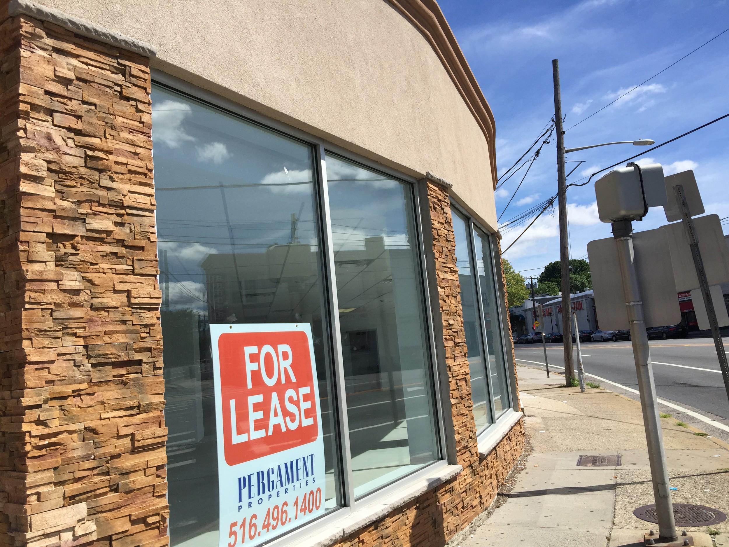 A storefront at the corner of Merrick Road and Grand Avenue is one of the many empty sites that are included in the redevelopment.