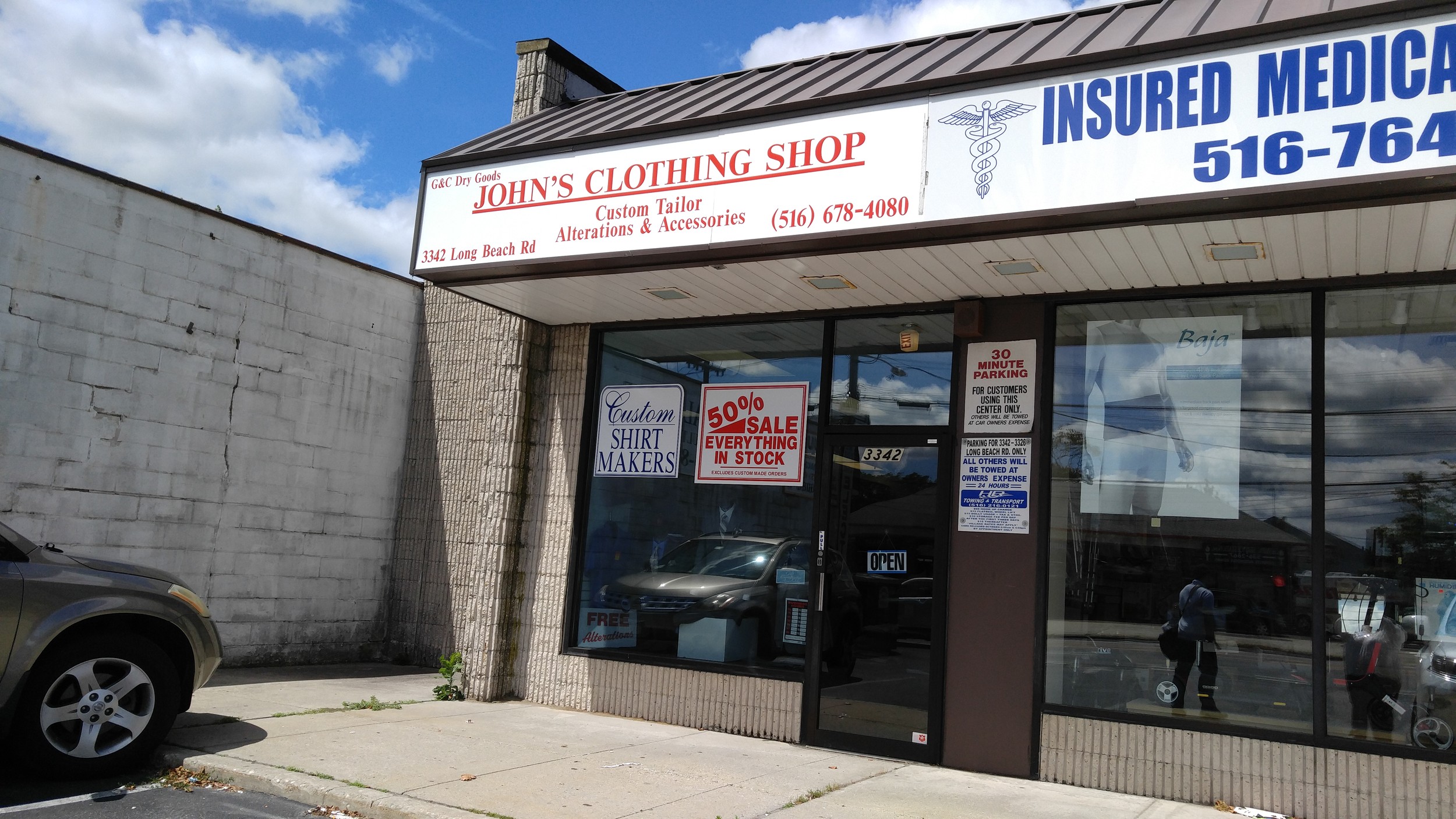 The temporary location for John’s Clothing Shop.